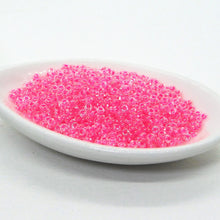  11/0 Toho Demi Rounds_#978 Neon Pink Lined Crystal Clear_Pink Lined Clear_Demis_9 grams