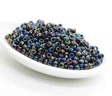  11 grams_8/0 Toho Seed Beads_Color #86_Metallic Blue Rainbow Iris